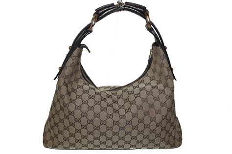 brwon gucci bag w snake clasp|gucci leather shoulder bag.